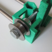 Close-up of the x-idler bearing over which the x-axis timing belt is mounted.